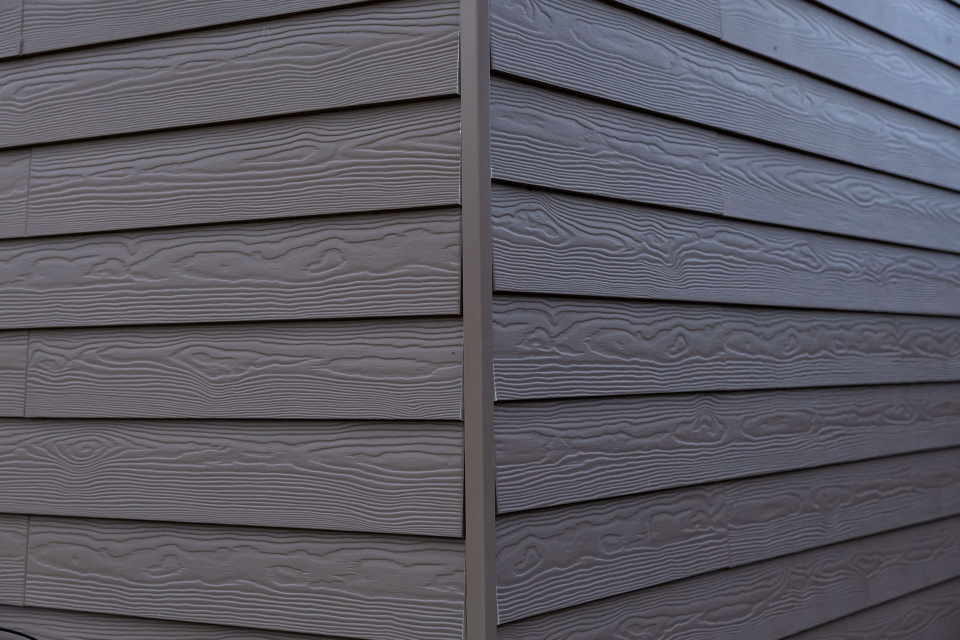 Corner of Modern House with Gray Horizontal Wood Grain Siding